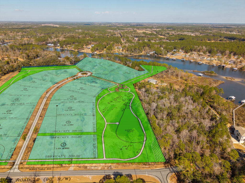 land, water, aerial view of wooded waterfront property and homesites along Wolf Creek in South Alabama