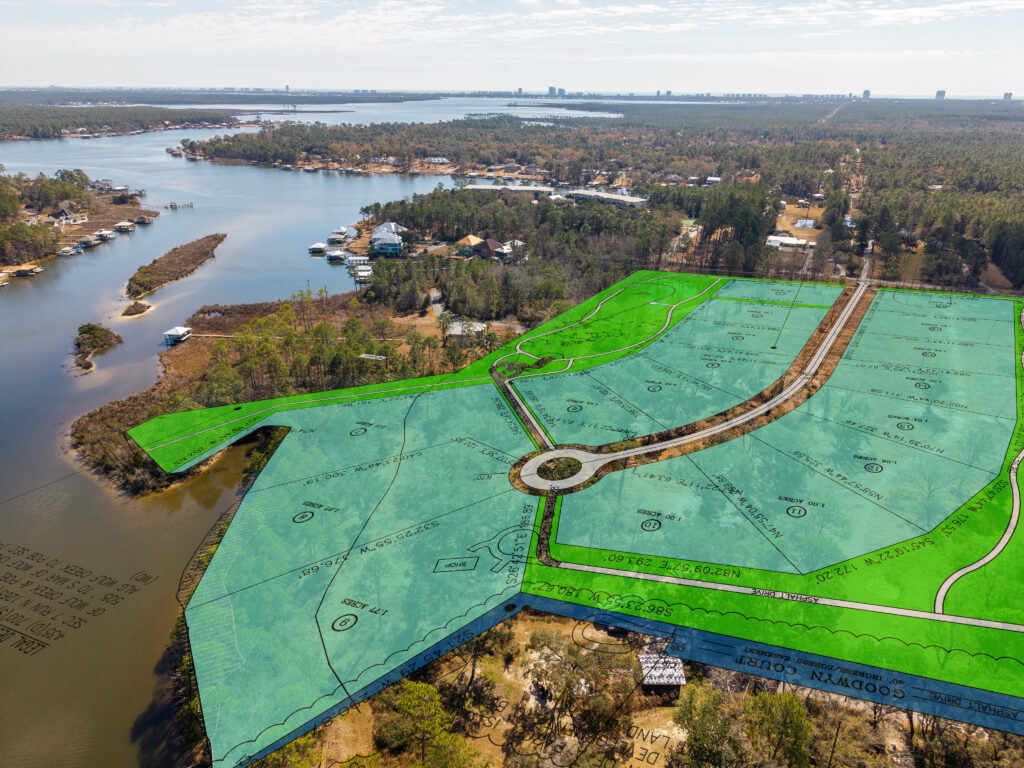 land, water, aerial view of wooded waterfront property and homesites along Wolf Creek in South Alabama